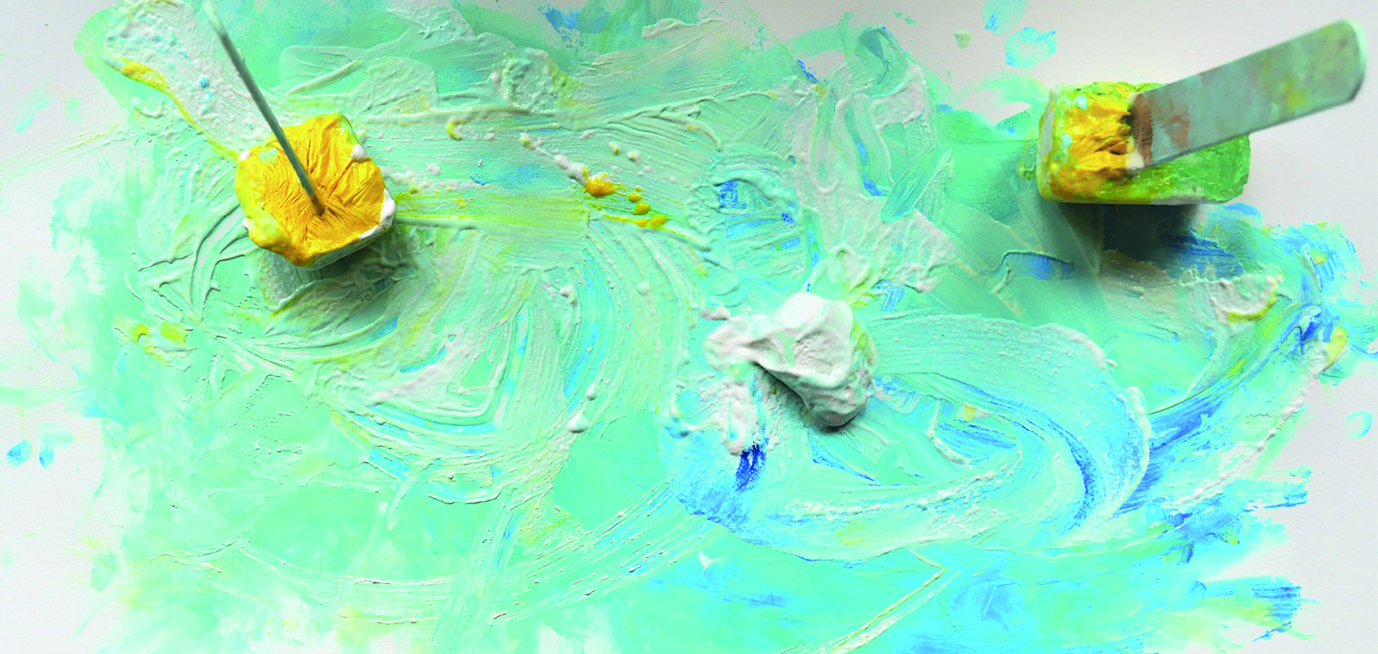 dessin d'enfant fait avec glaçons et peinture
